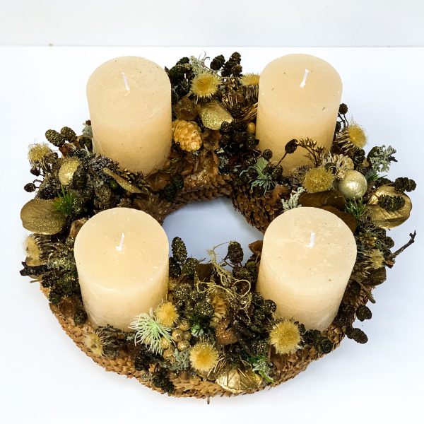Advent wreath with dried flowers, cream candles