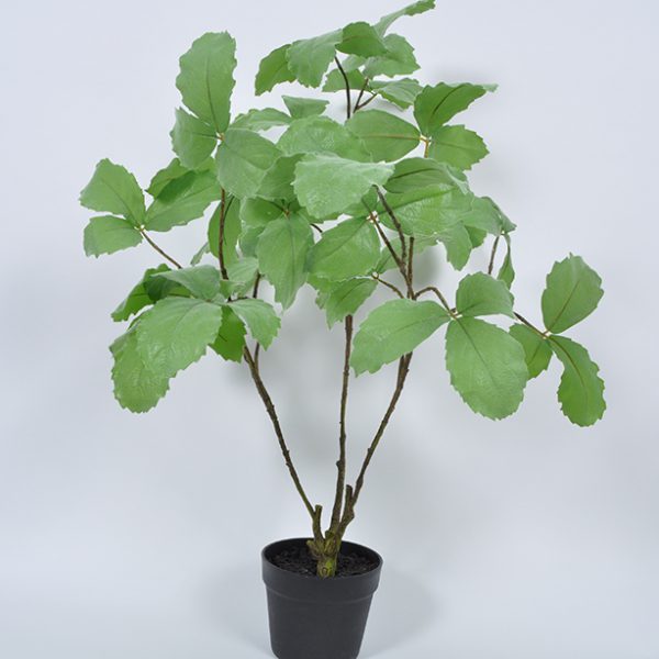 Green plant in pot - artificial